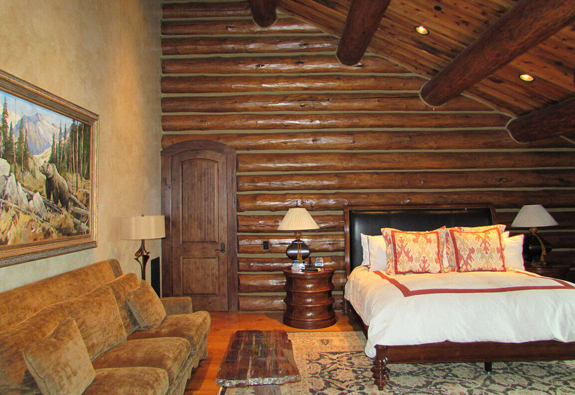 Multi level faux finish on walls, stain and glaze on logs